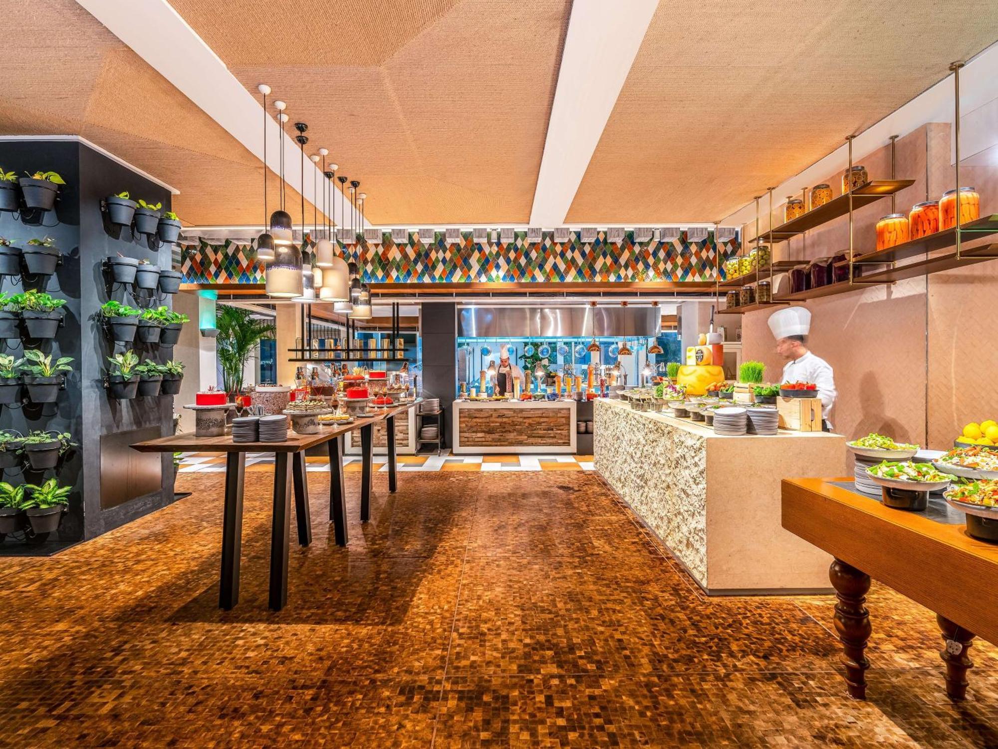 Rixos Gulf Hotel Doha Exteriör bild The Kitchen