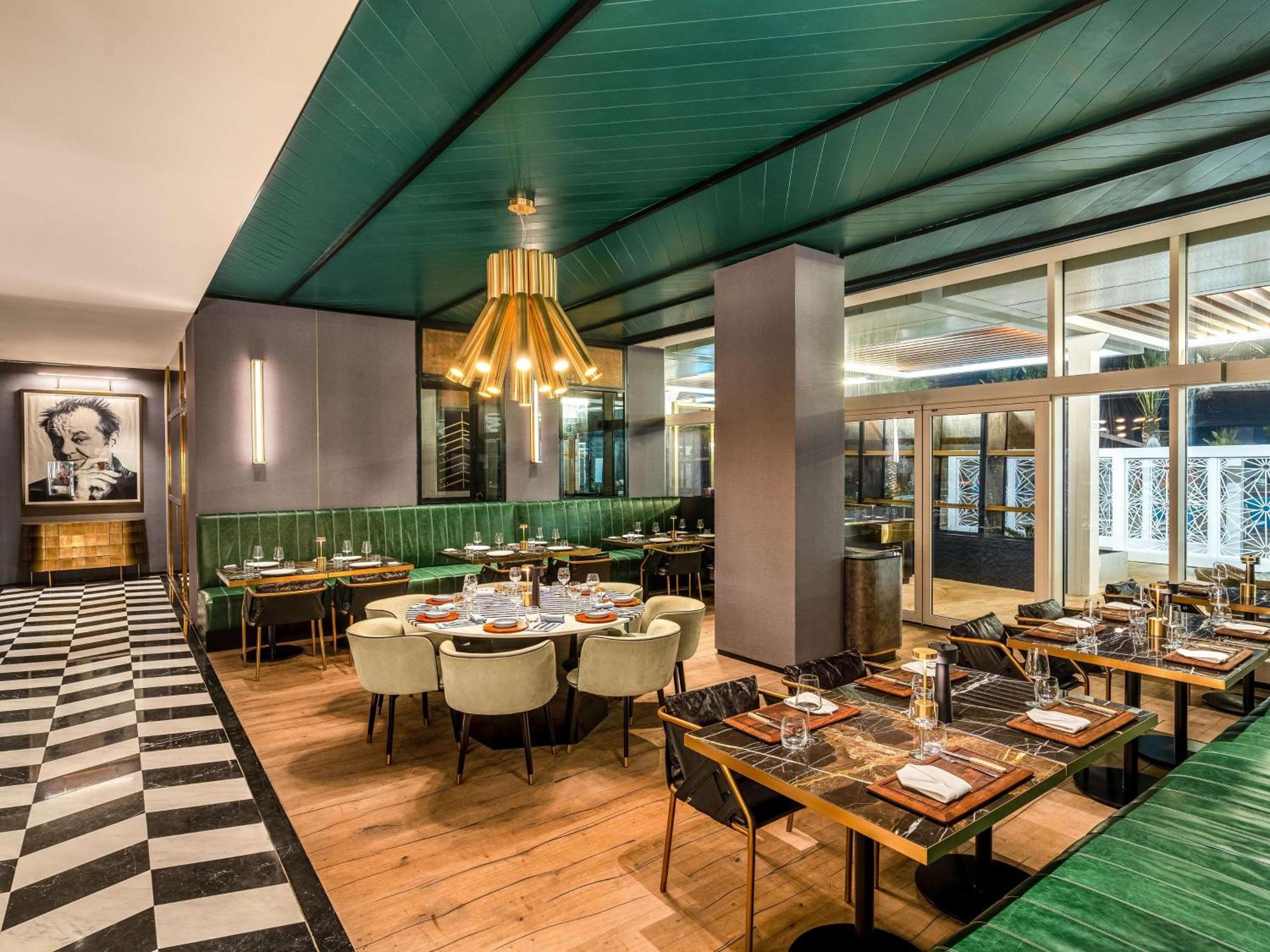 Rixos Gulf Hotel Doha Exteriör bild Restaurant