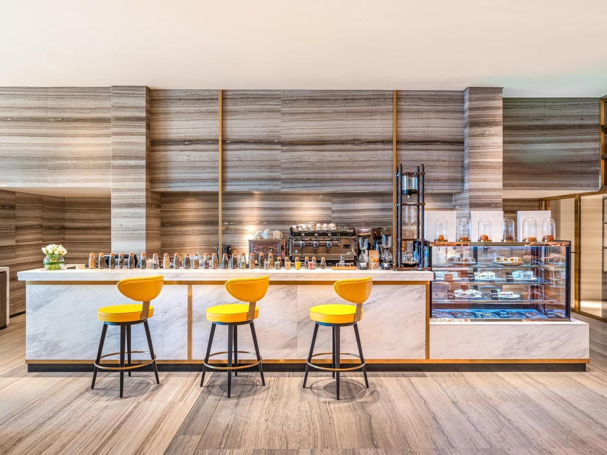 Rixos Gulf Hotel Doha Exteriör bild The Coffee Bar