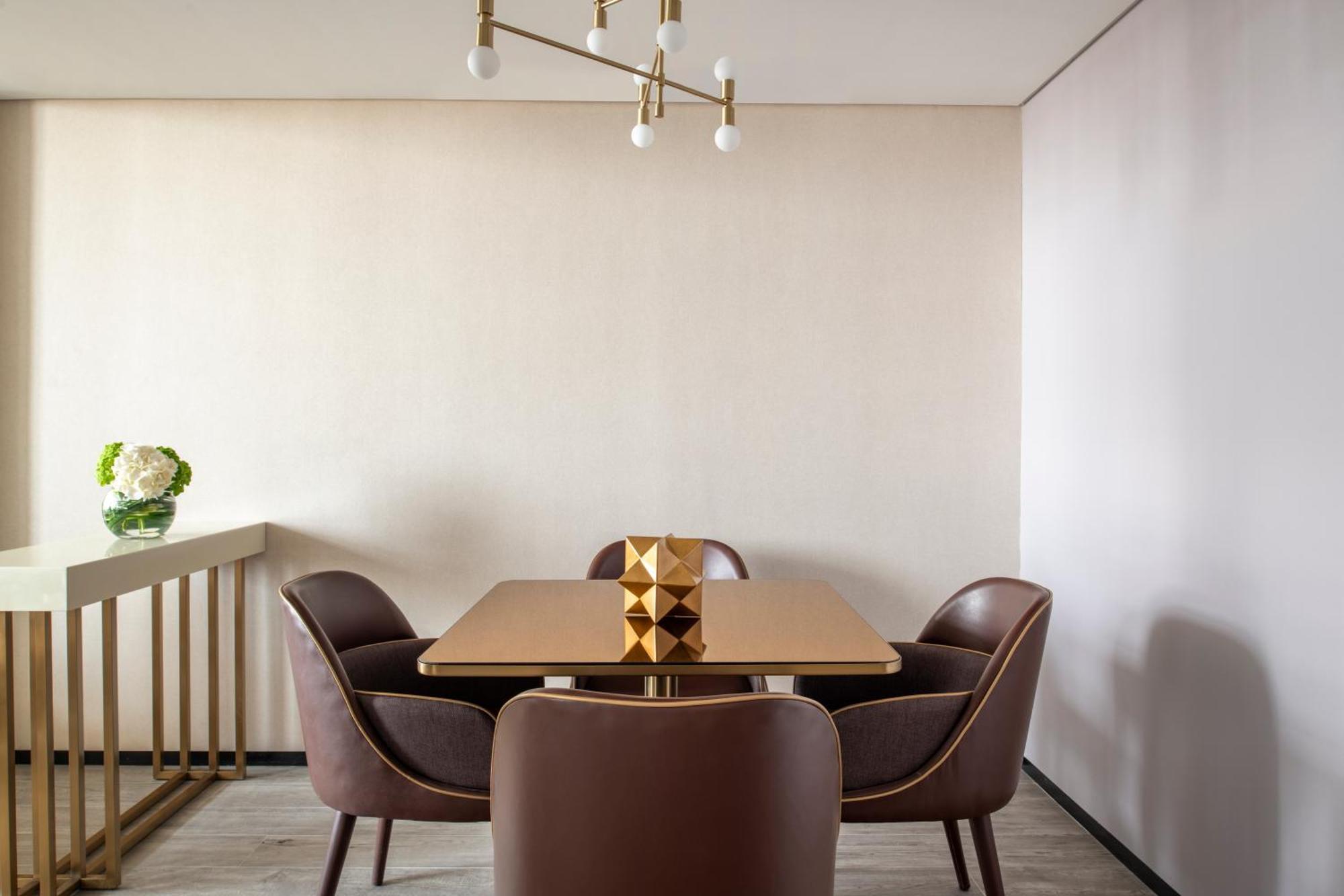 Rixos Gulf Hotel Doha Rum bild A dining room